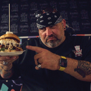 VooDoo Chef showing off one of the burgers from VooDoo Bash 2022
